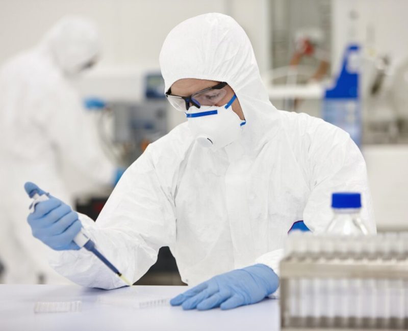 Scientists working in laboratory